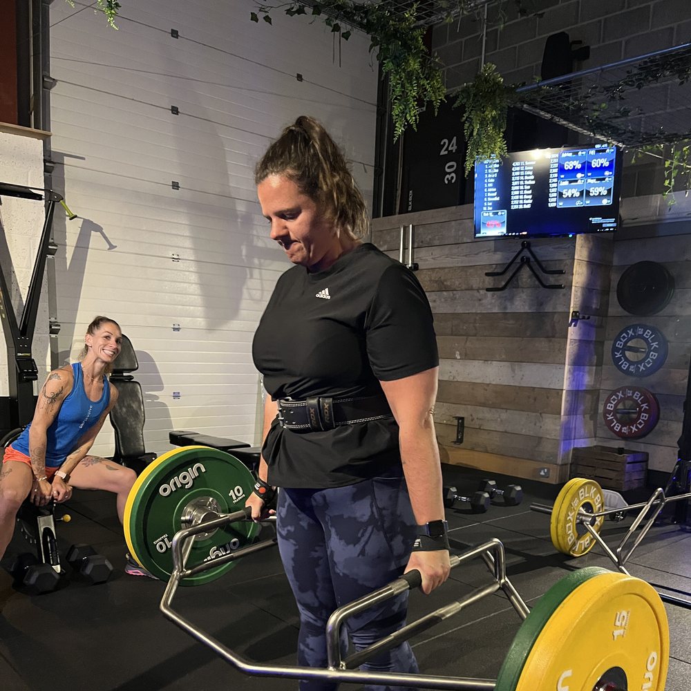 Member deadlifting at DMF Evolve