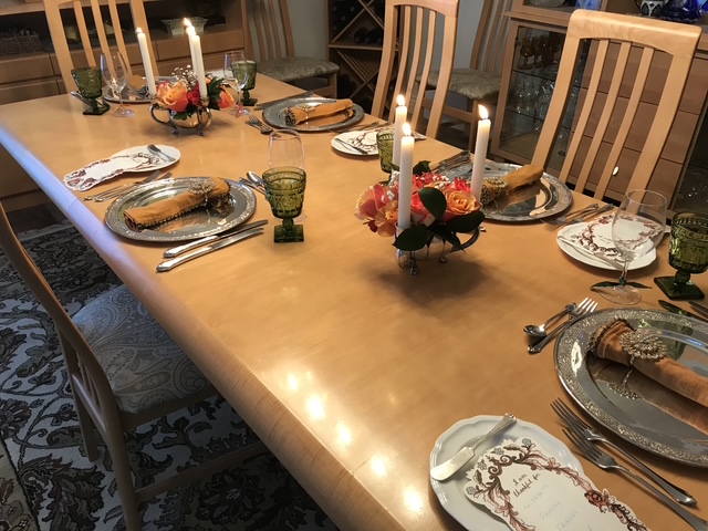 An elegant dining table styled for the room