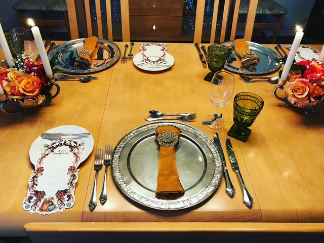 Detail of a styled dining table arrangement