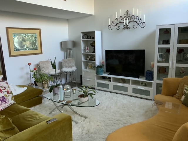 Closet storage shelving with items arranged in accessible stacks