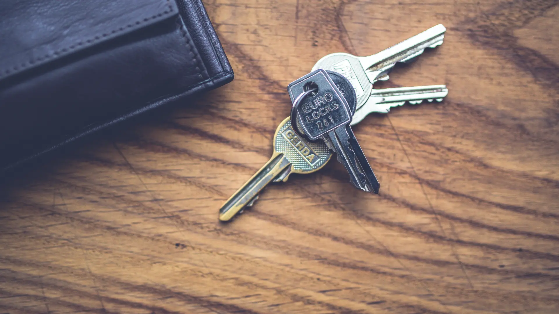 House keys on a windowsill after a vacant Ohio property was sold for cash