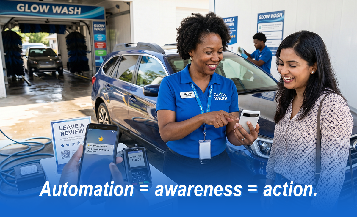 Car wash employee showing customer mobile review and referral features near wash bay, highlighting automated marketing, customer engagement, and growth for car wash businesses.