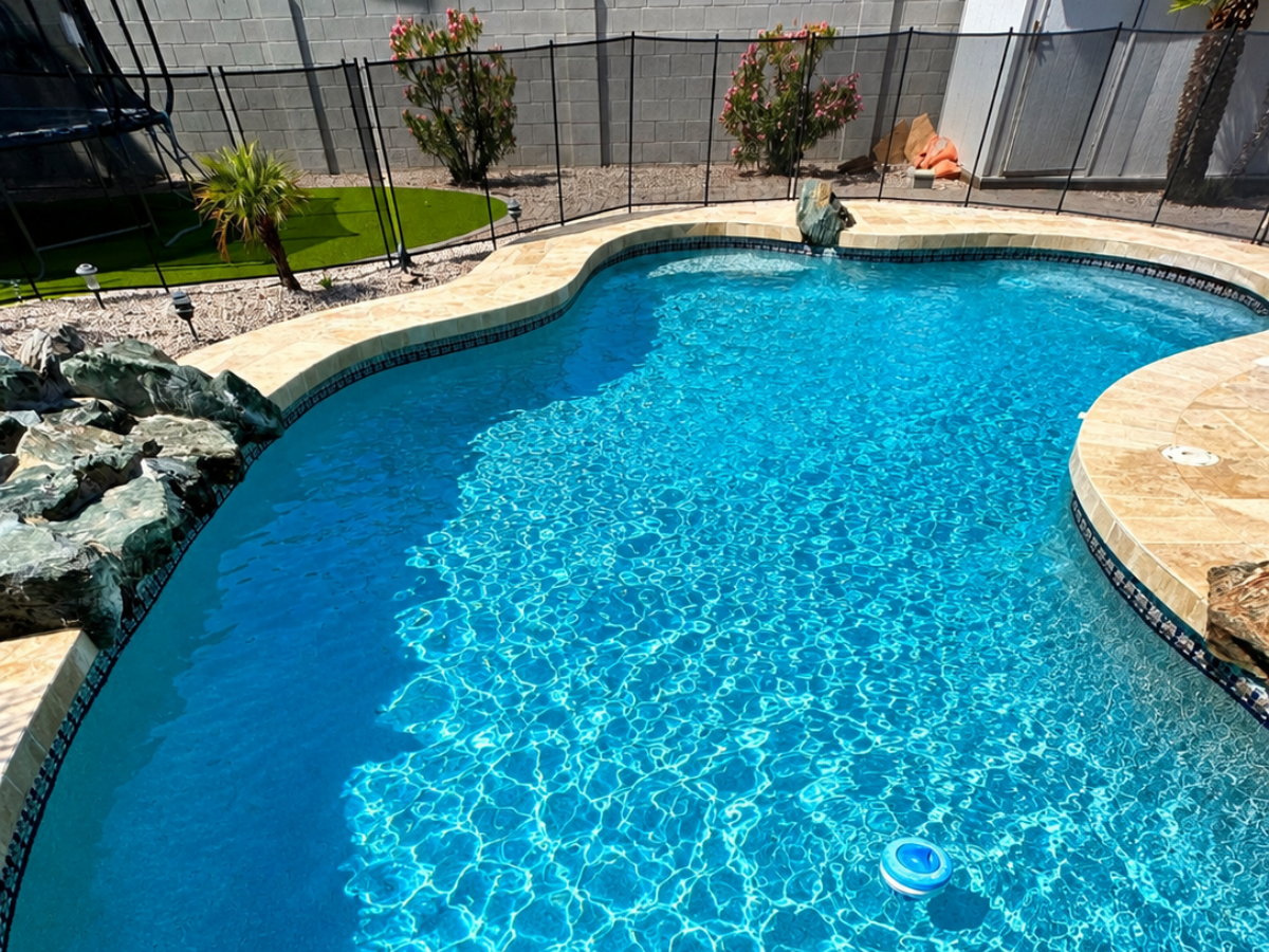 Pool cleaning service in Prosper TX backyard swimming pool with sparkling blue water
