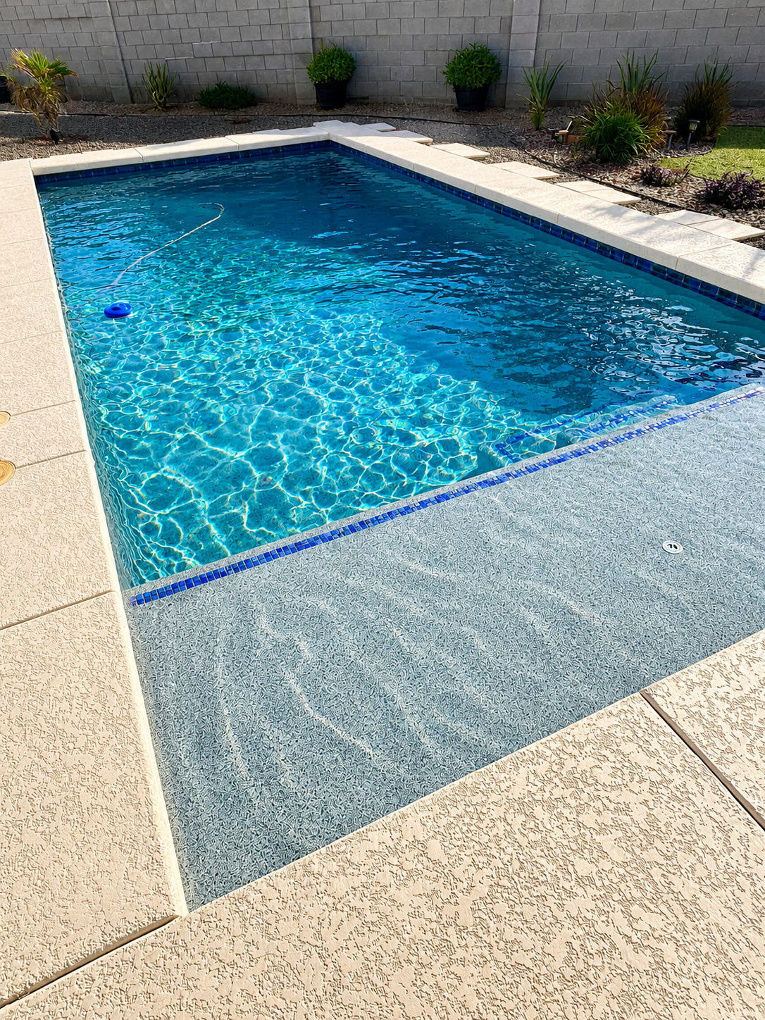 Crystal clear pool water in Windsong Ranch Prosper TX neighborhood
