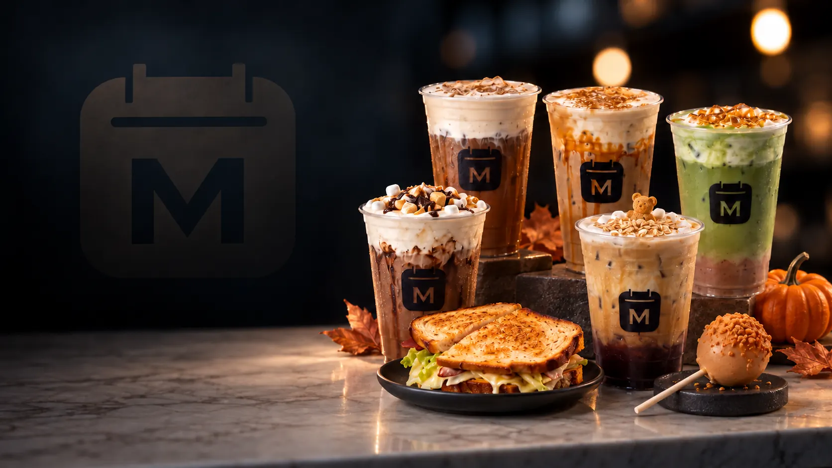 Monday Coffee Club signature drinks and branded cups