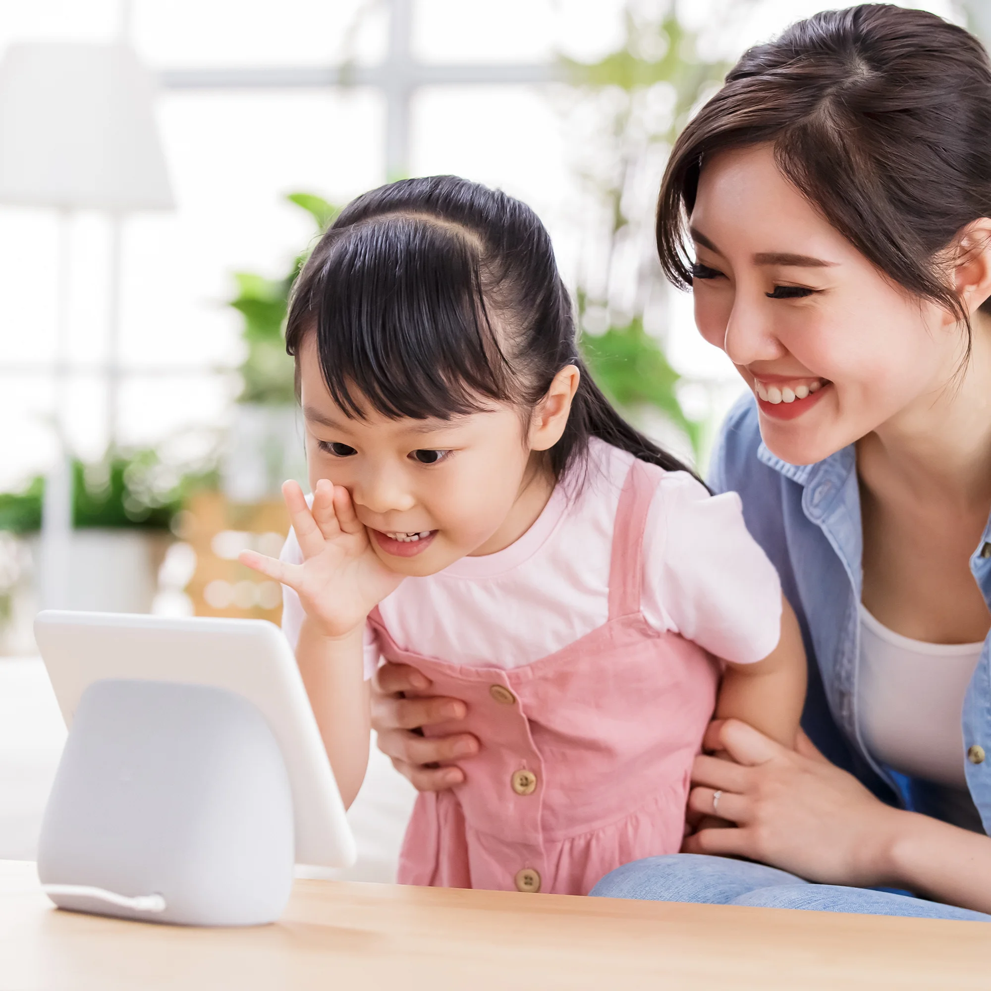Warm educational scene: teacher and child learning moment