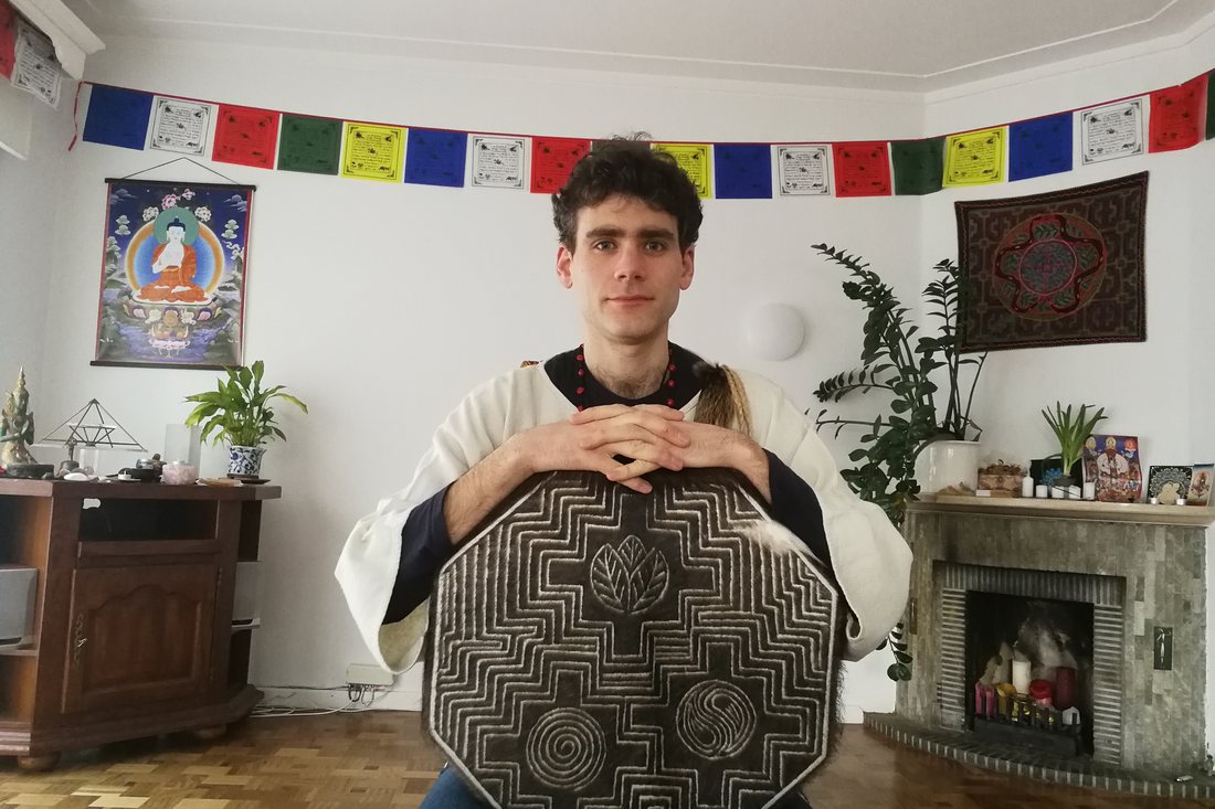 A shamanic frame drum held in two hands