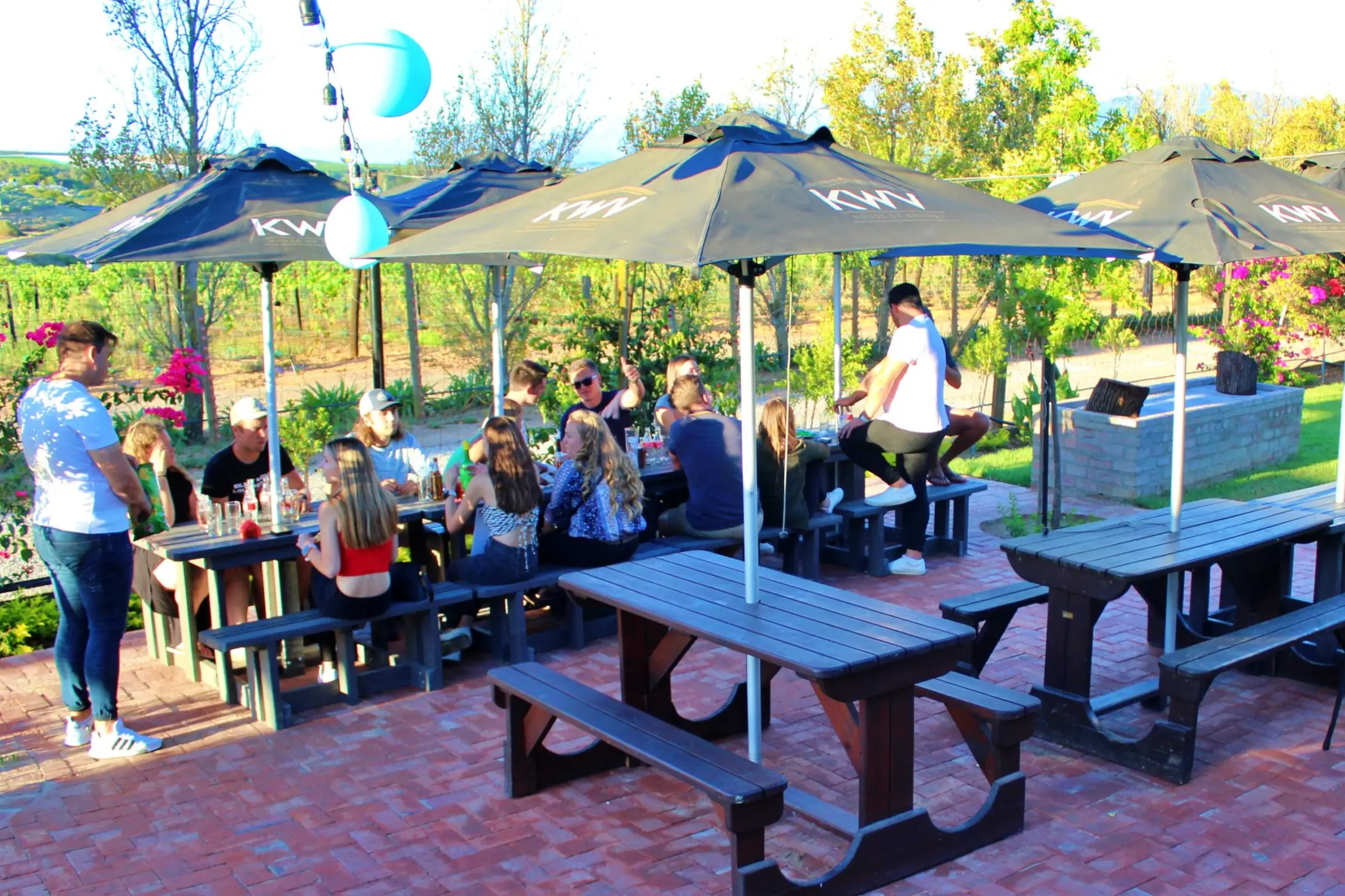 Outside seating area under umbrellas at Breezy's