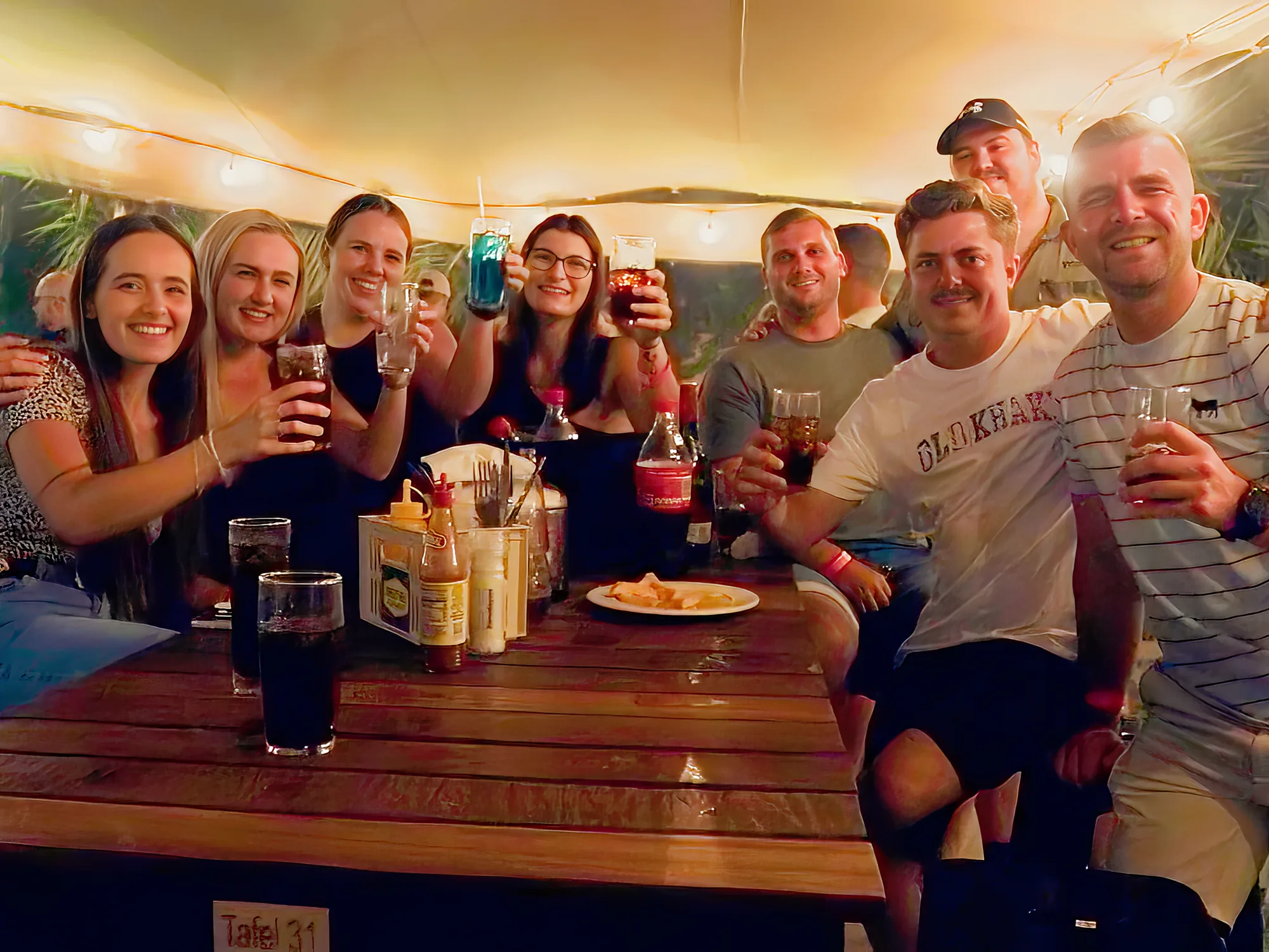 Group of guests at a table at Breezy's