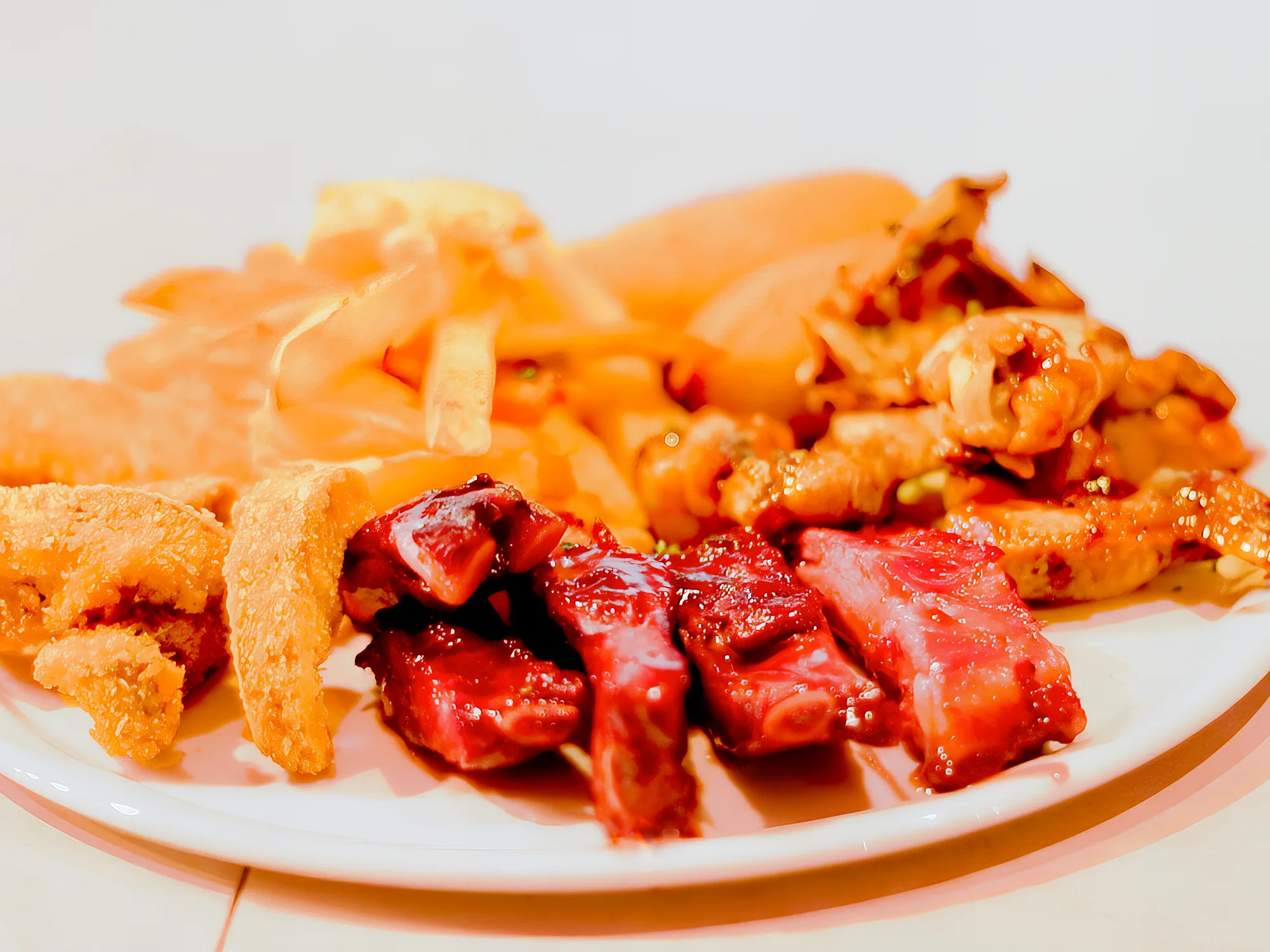 Share plate of ribs, wings and chips at Breezy's
