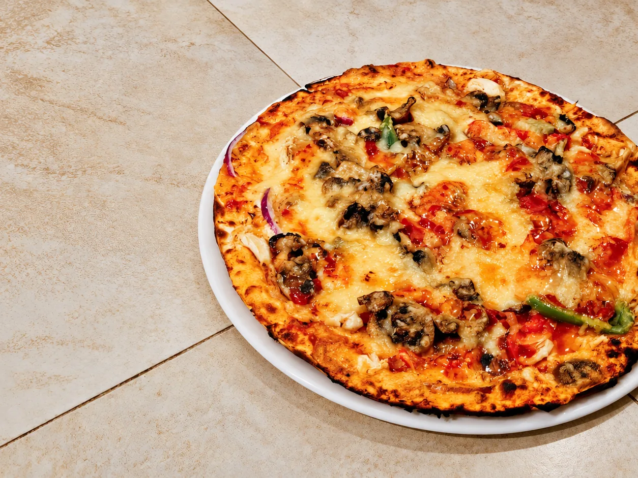 Pizza served at a table at Breezy's