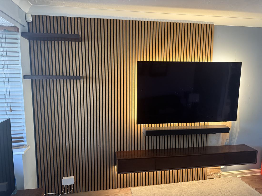 Slatted media wall