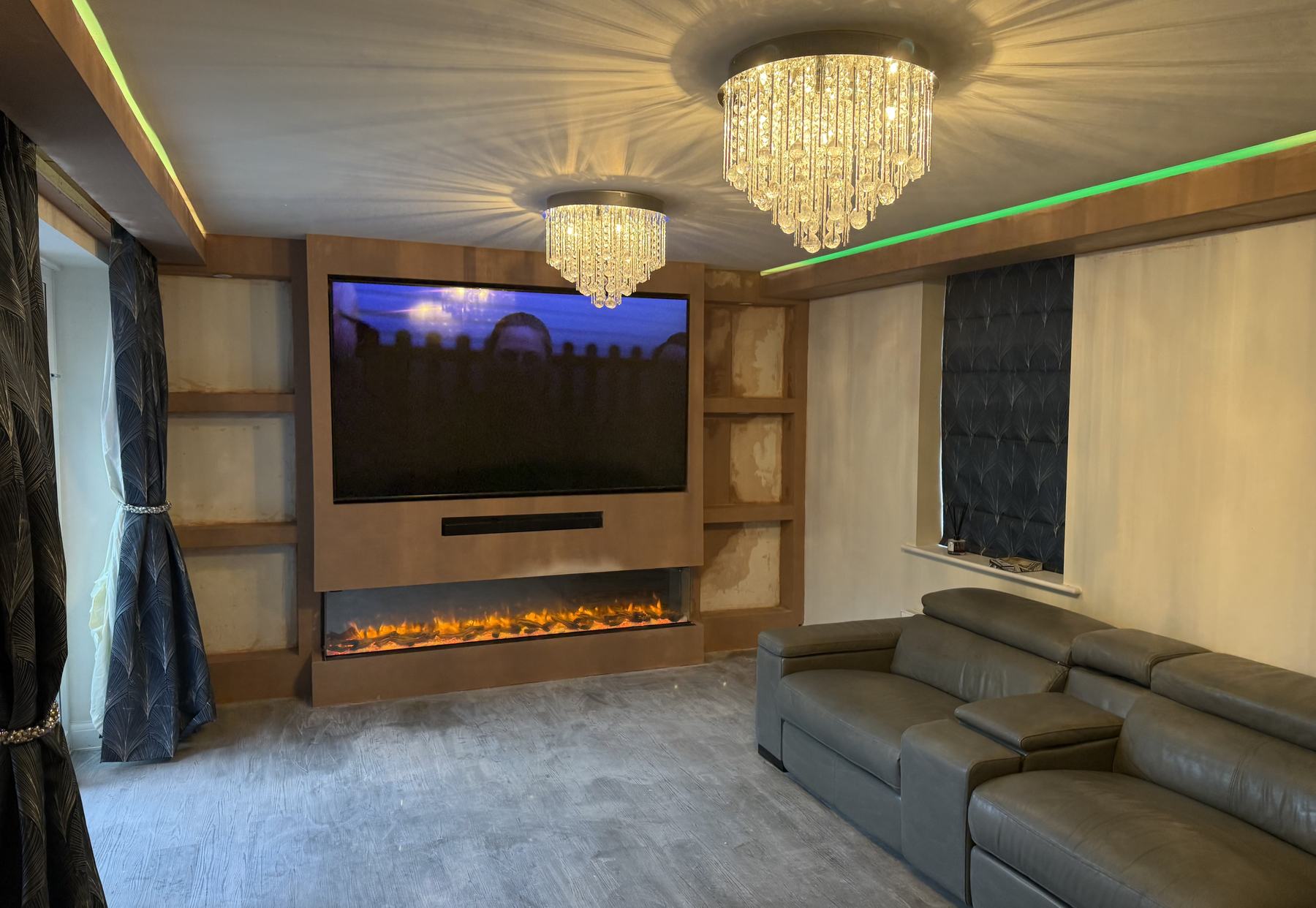 Media wall with fire and a matching feature ceiling