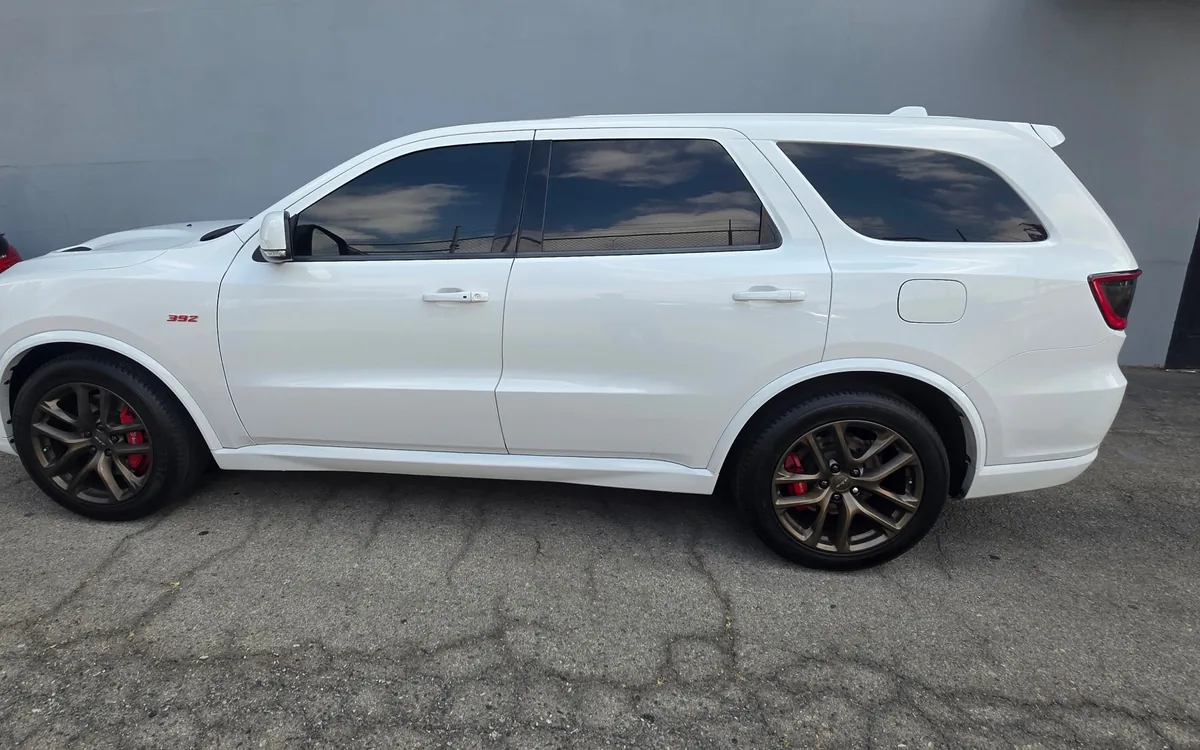 Dodge Durango SUV side view with tinted side and rear windows