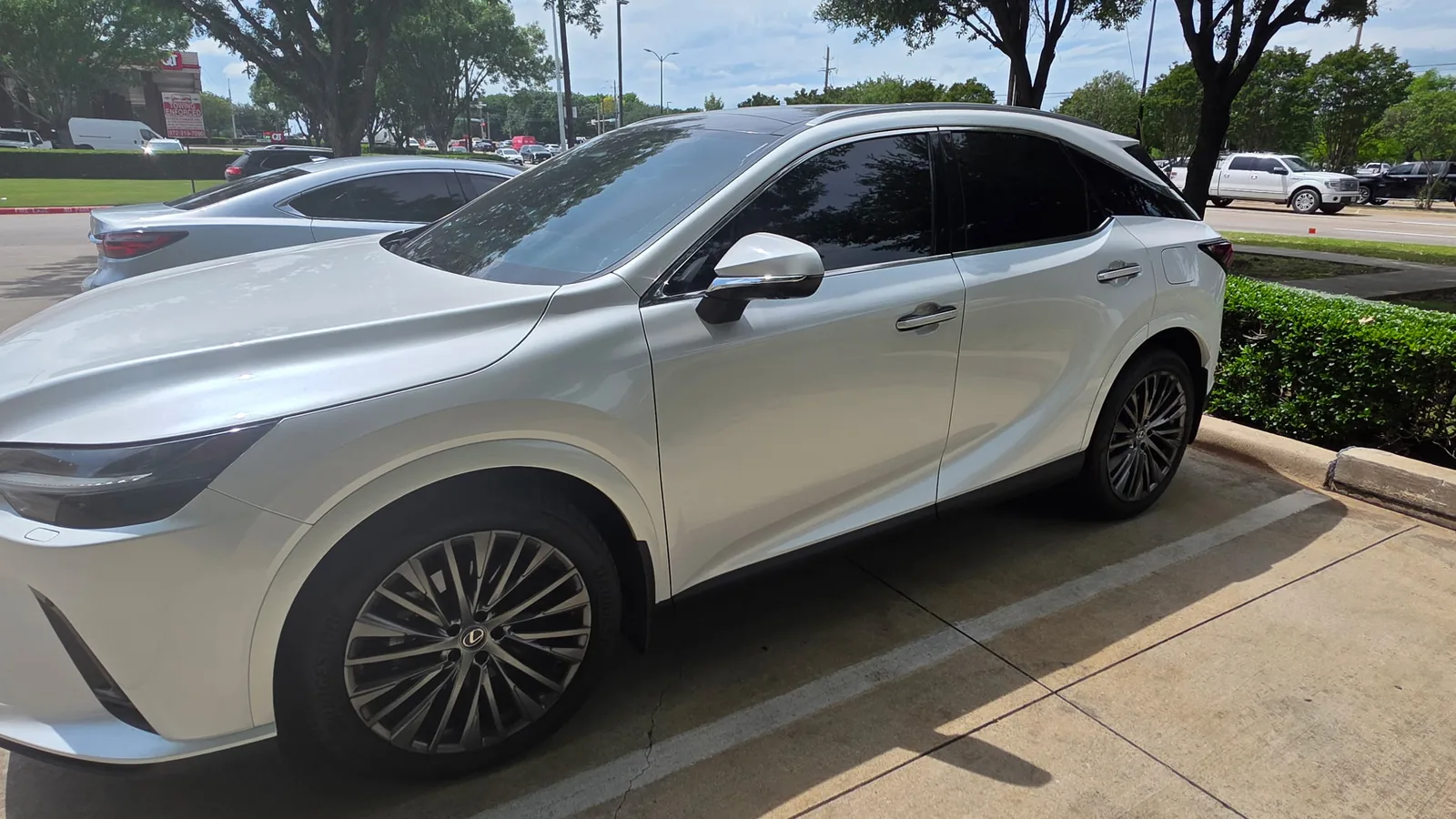 Lexus RX with freshly installed window tint, parked outdoors in Collin County