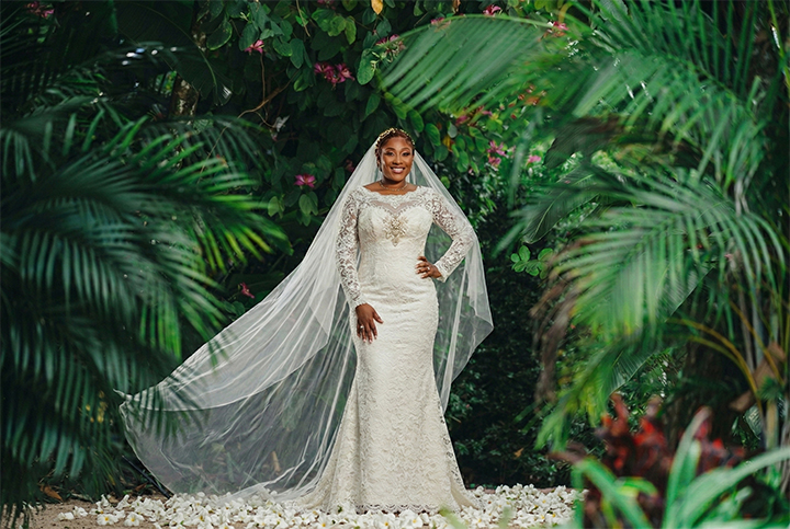 Bride in lush tropical garden setting