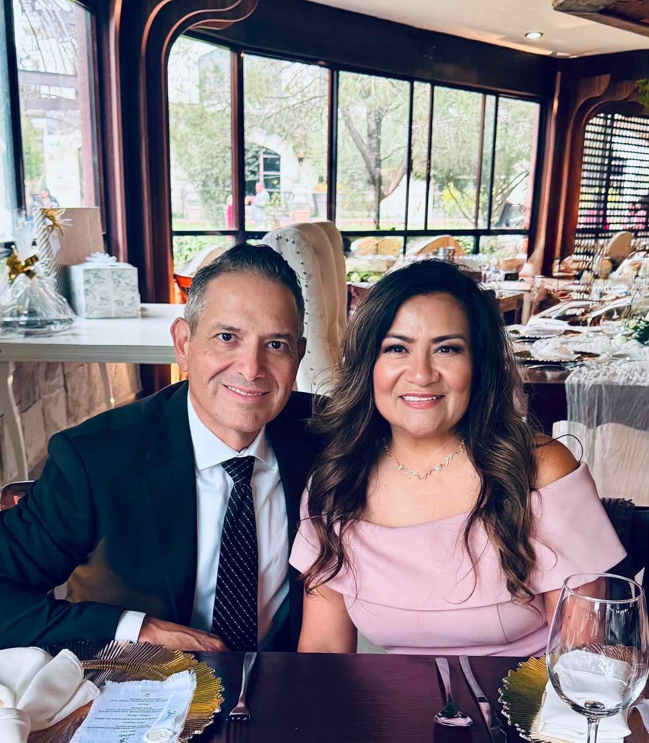 A couple at a formal dinner event