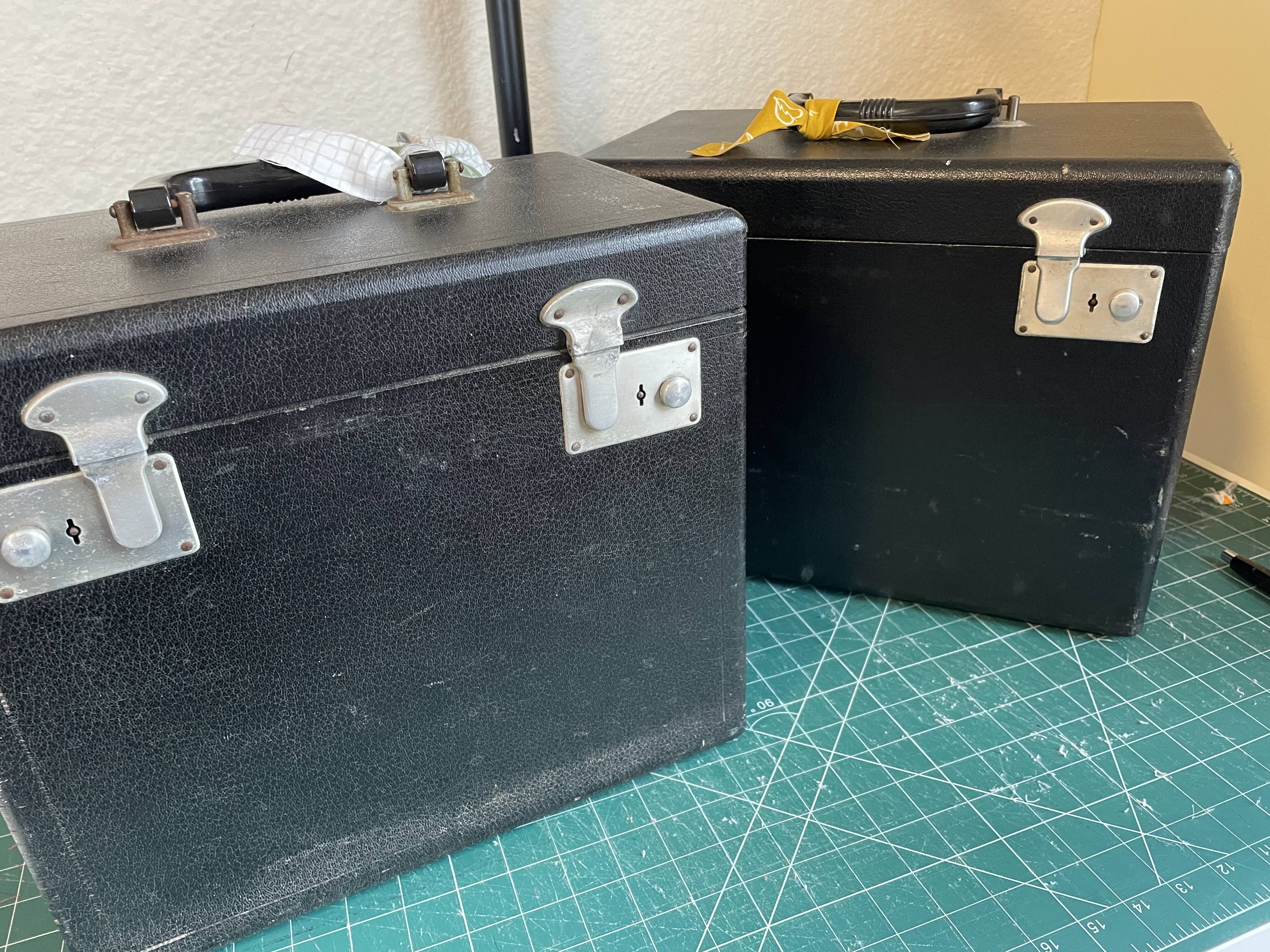 Original carrying cases for a Singer Featherweight 221 and Singer Featherweight 222 sewing machine. Original carrying cases for a Singer Featherweight 221 and Singer Featherweight 222 sewing machine.