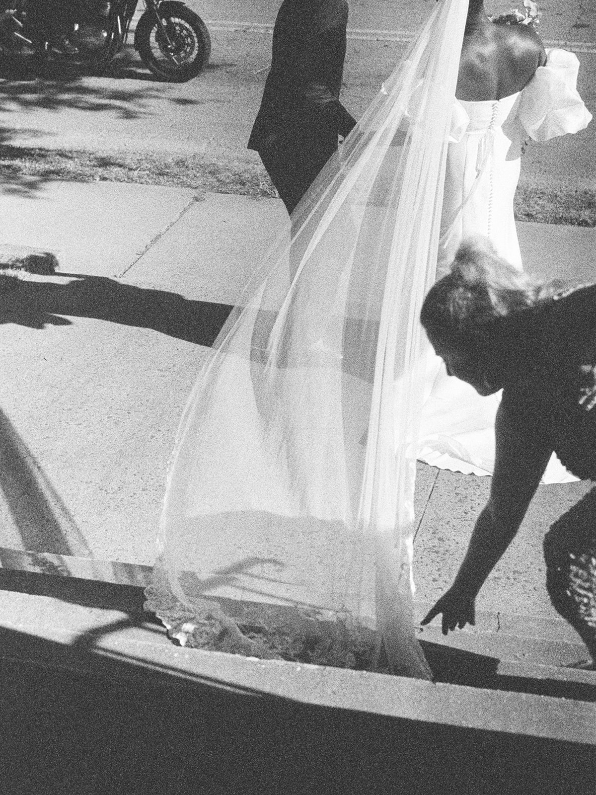 Documentary film frame of a bride’s veil caught in movement