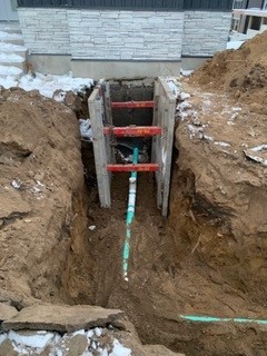 Sewer line installation and repair trench