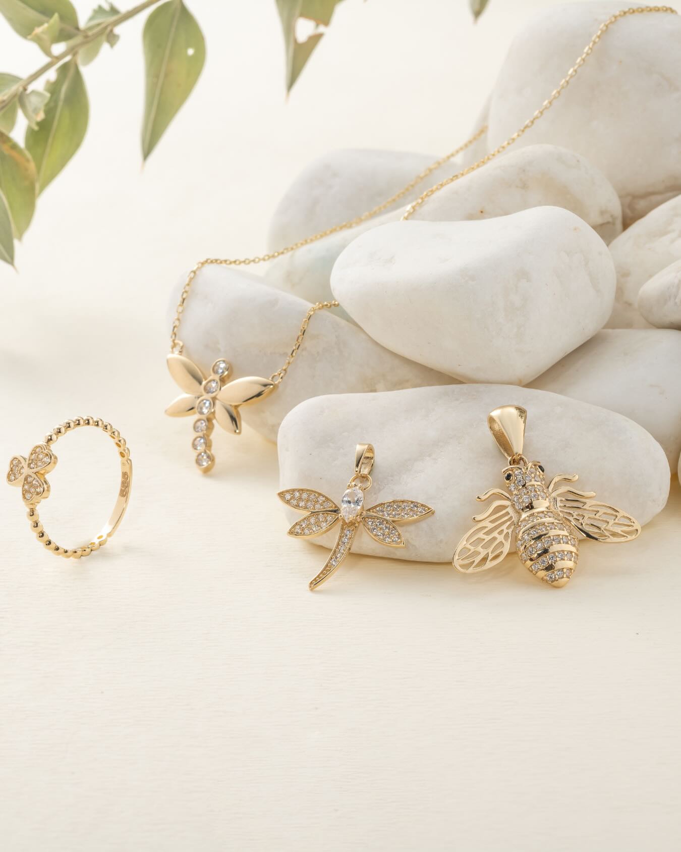 Gold dragonfly and bee pendants