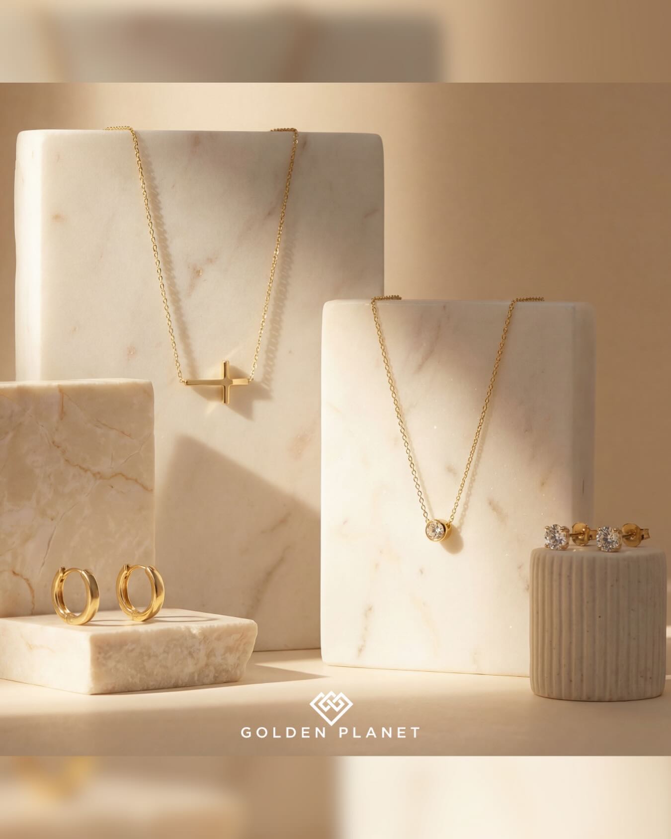 Gold jewelry on marble