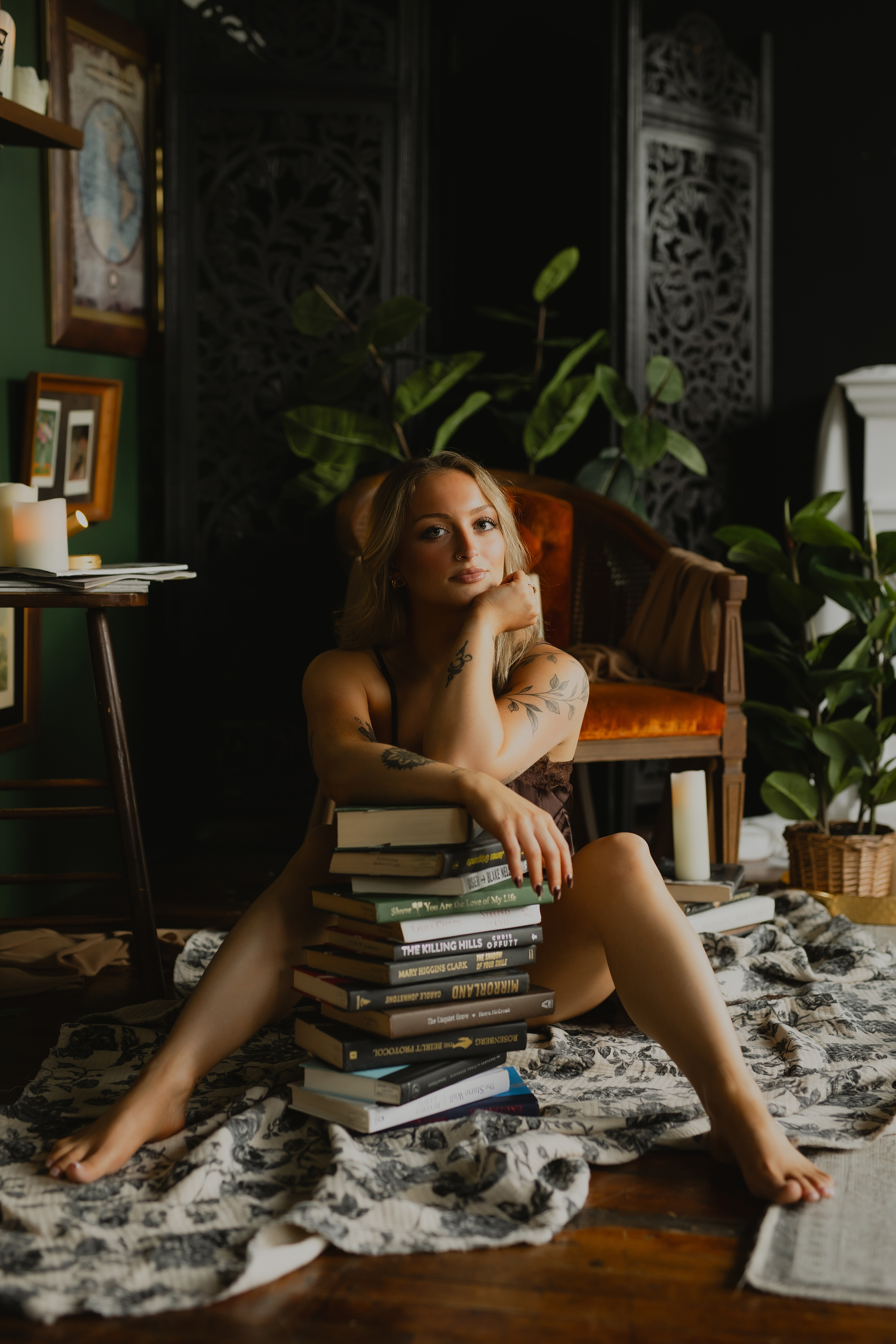 girl sitting with books