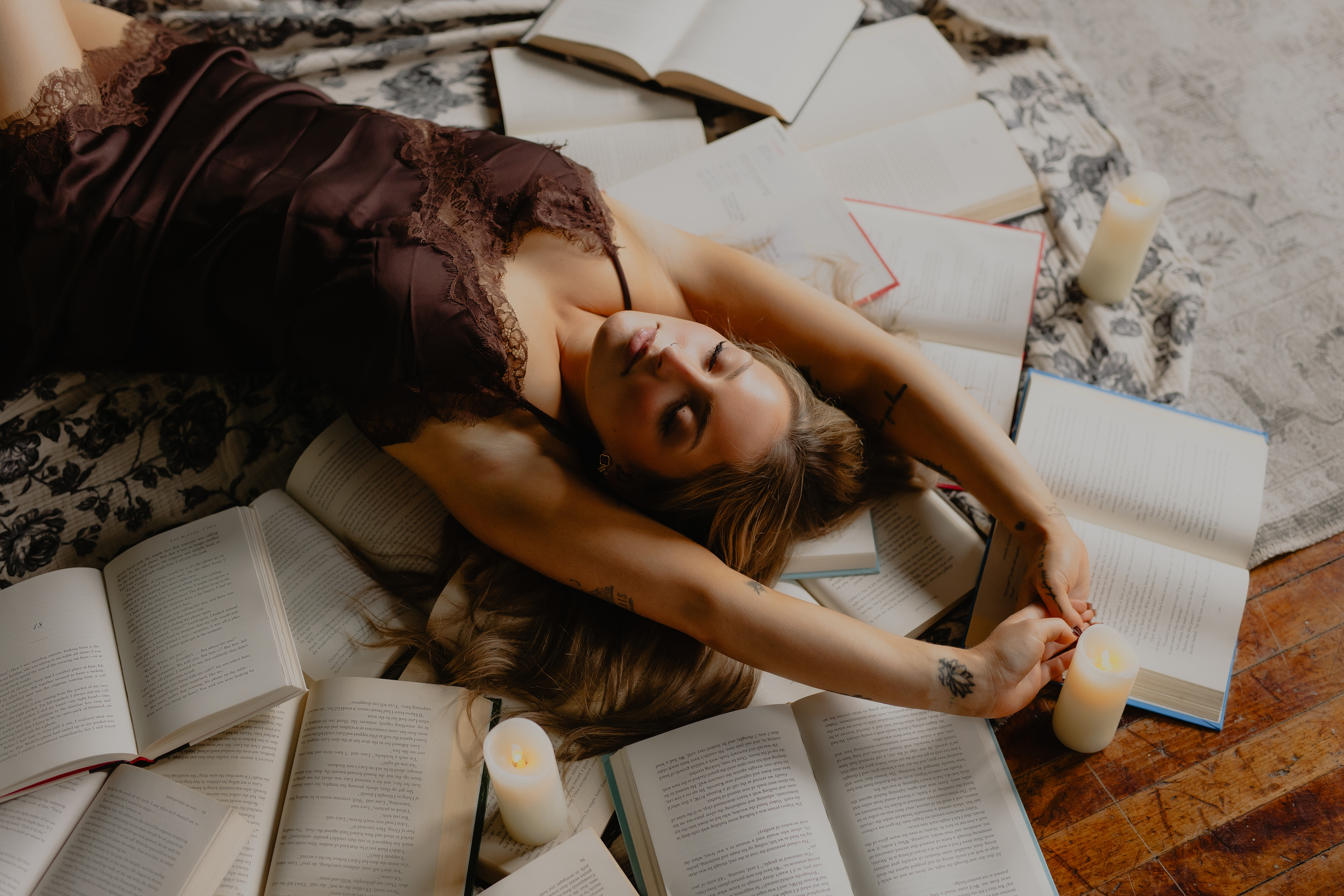 Girl laying on books