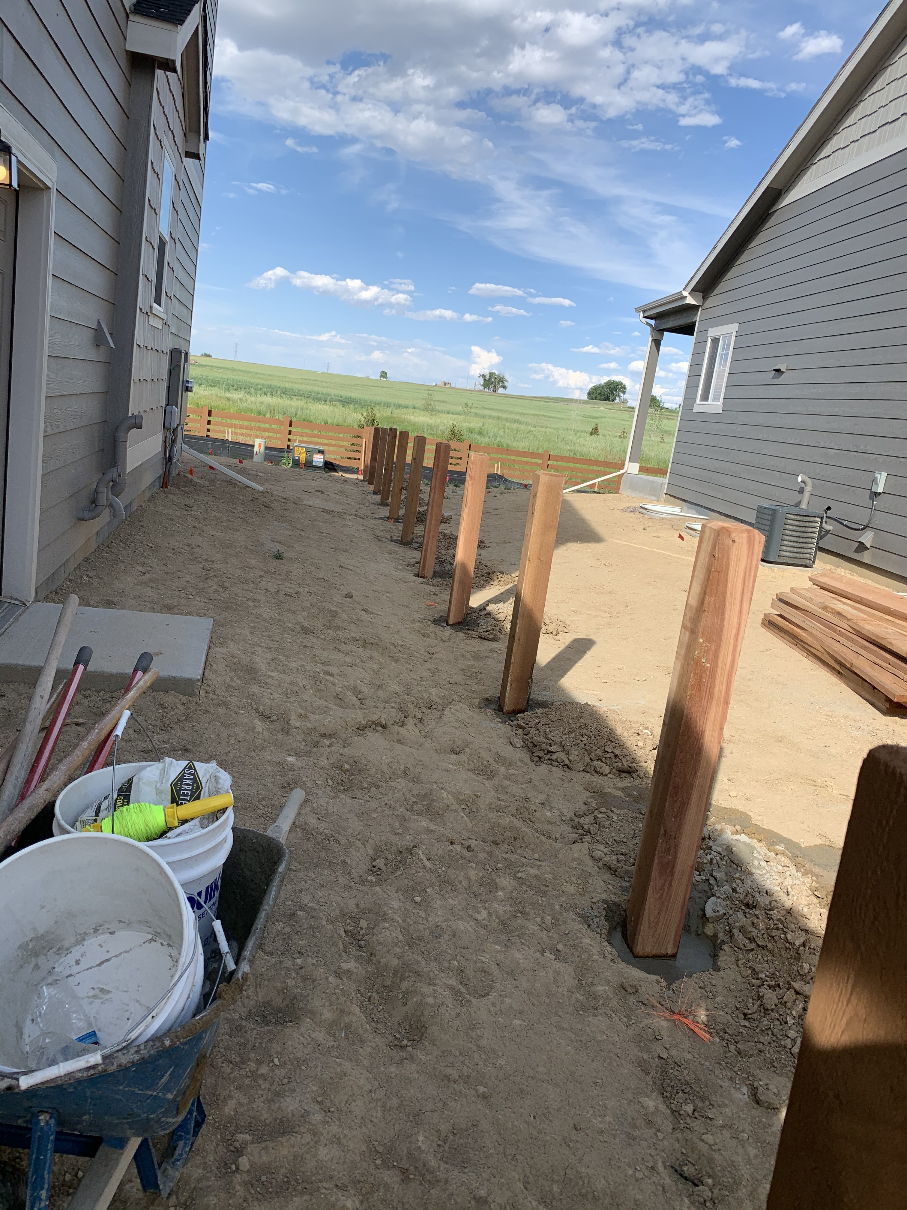 Wood ranch rail fence installed on an acreage property in Thornton, CO