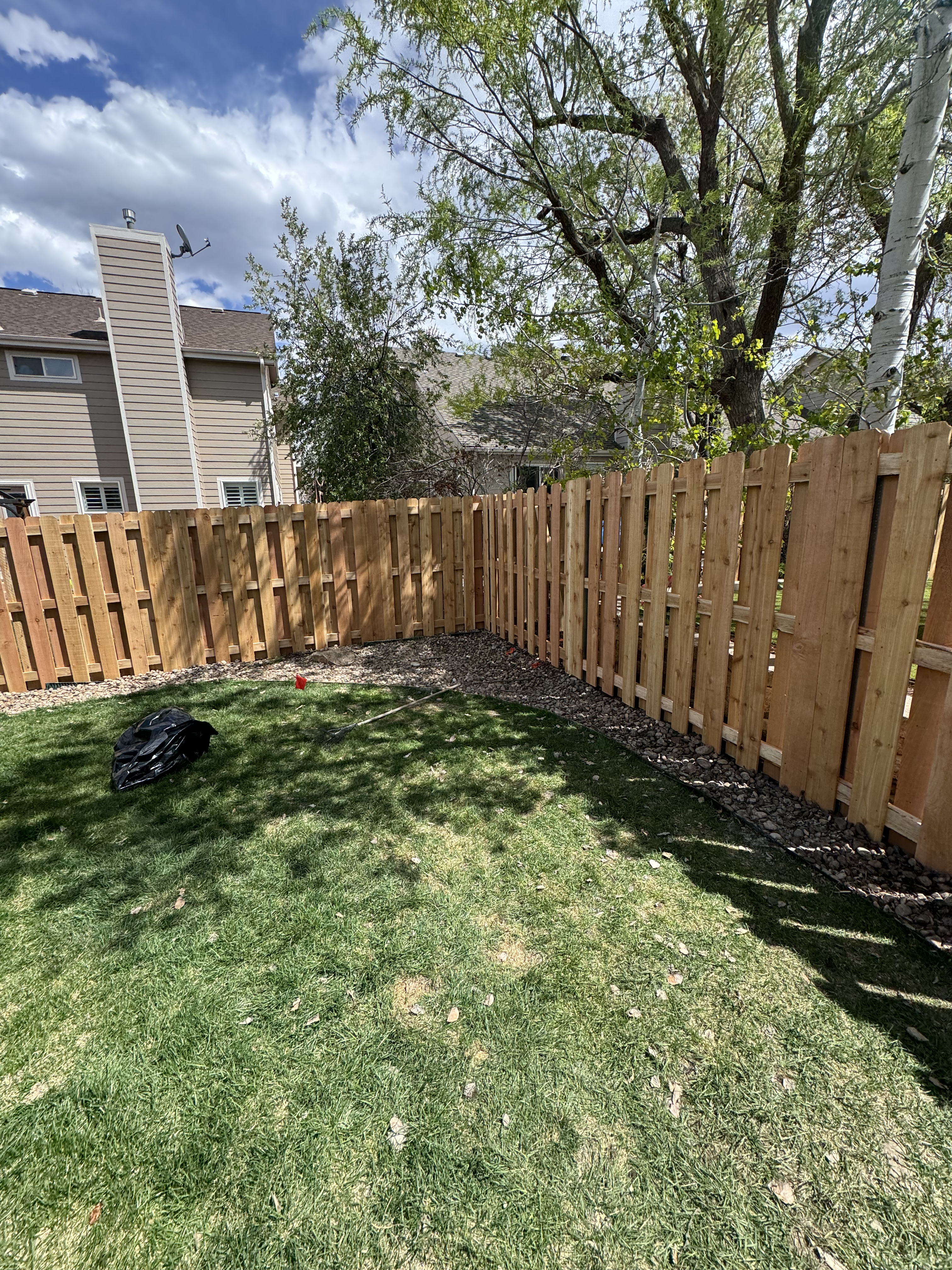 All About Fencing crew installing a ranch rail fence in Thornton, CO
