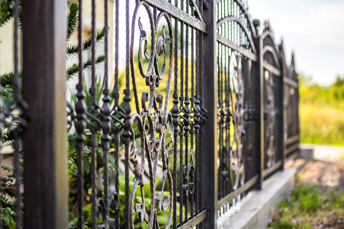 Custom ornamental iron fence installed in Thornton, CO