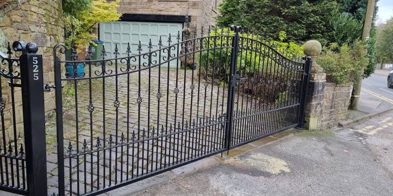 Custom iron driveway gate installed in Thornton, CO