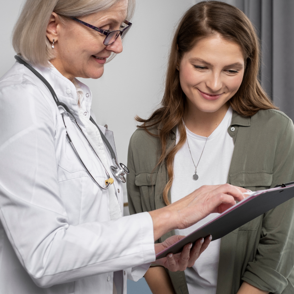 smiley-doctor-patient-chatting-medium-shot_1