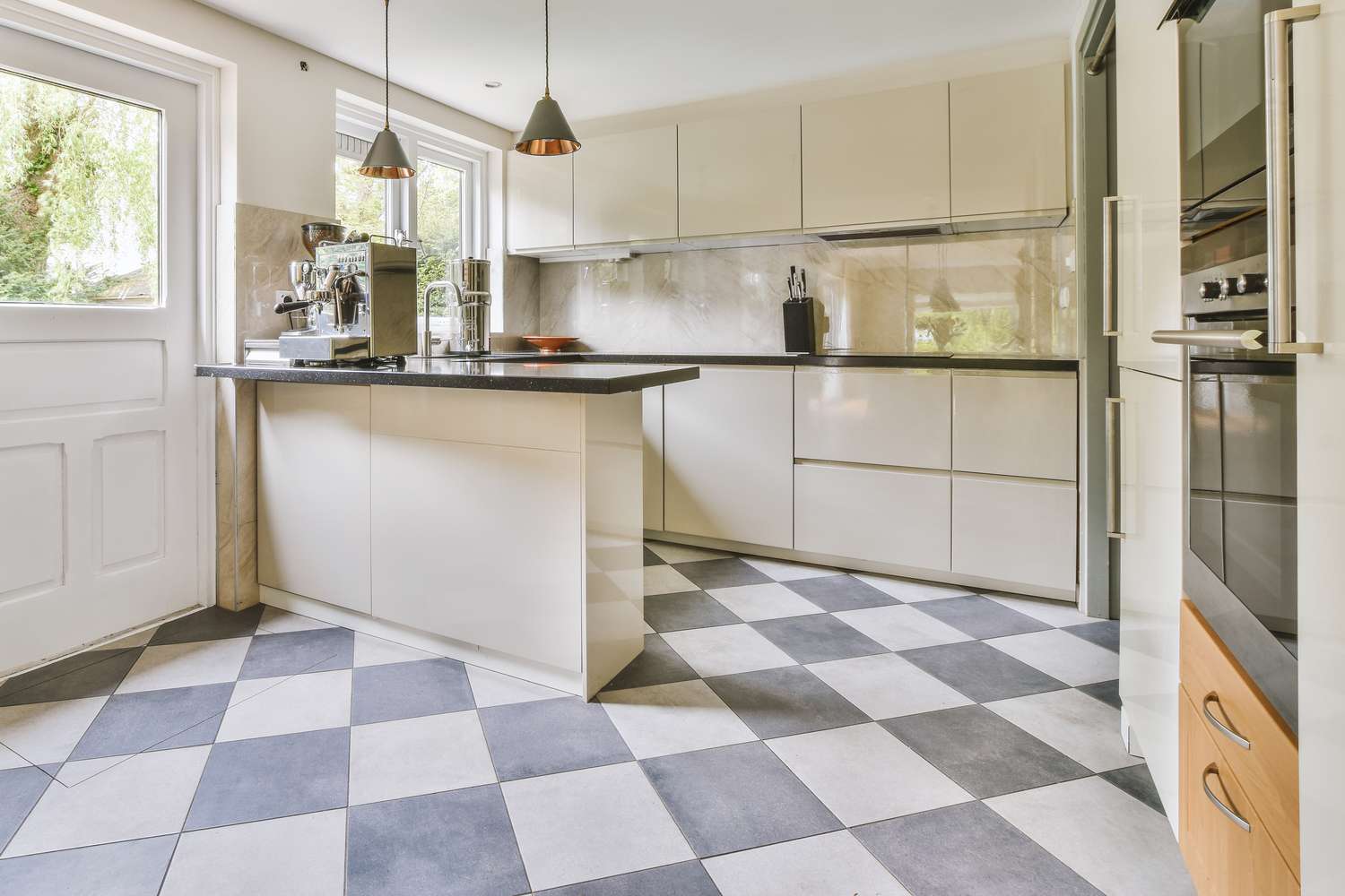 a kitchen with a checkered floor