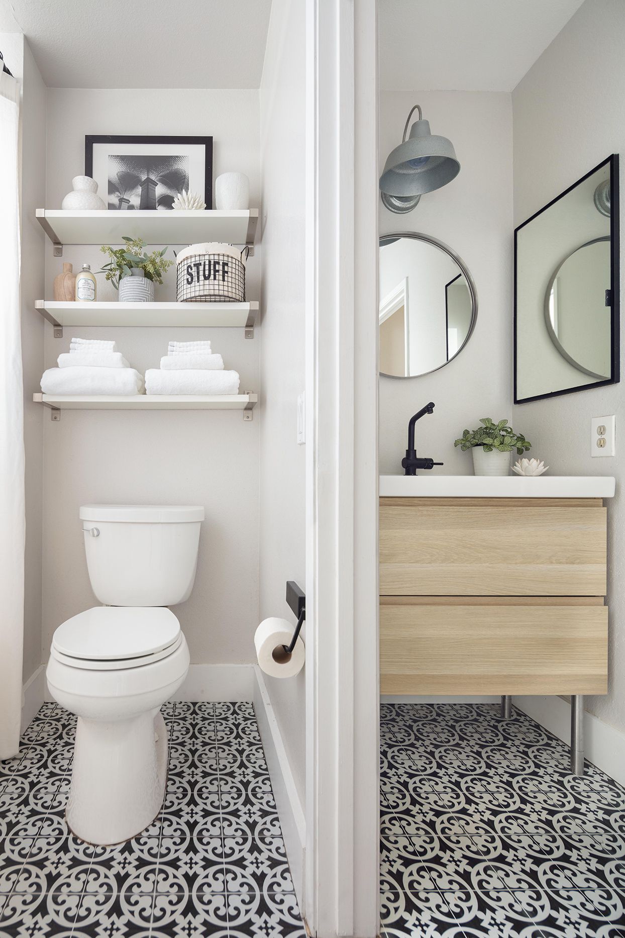 a bathroom with a sink, toilet, and shelving