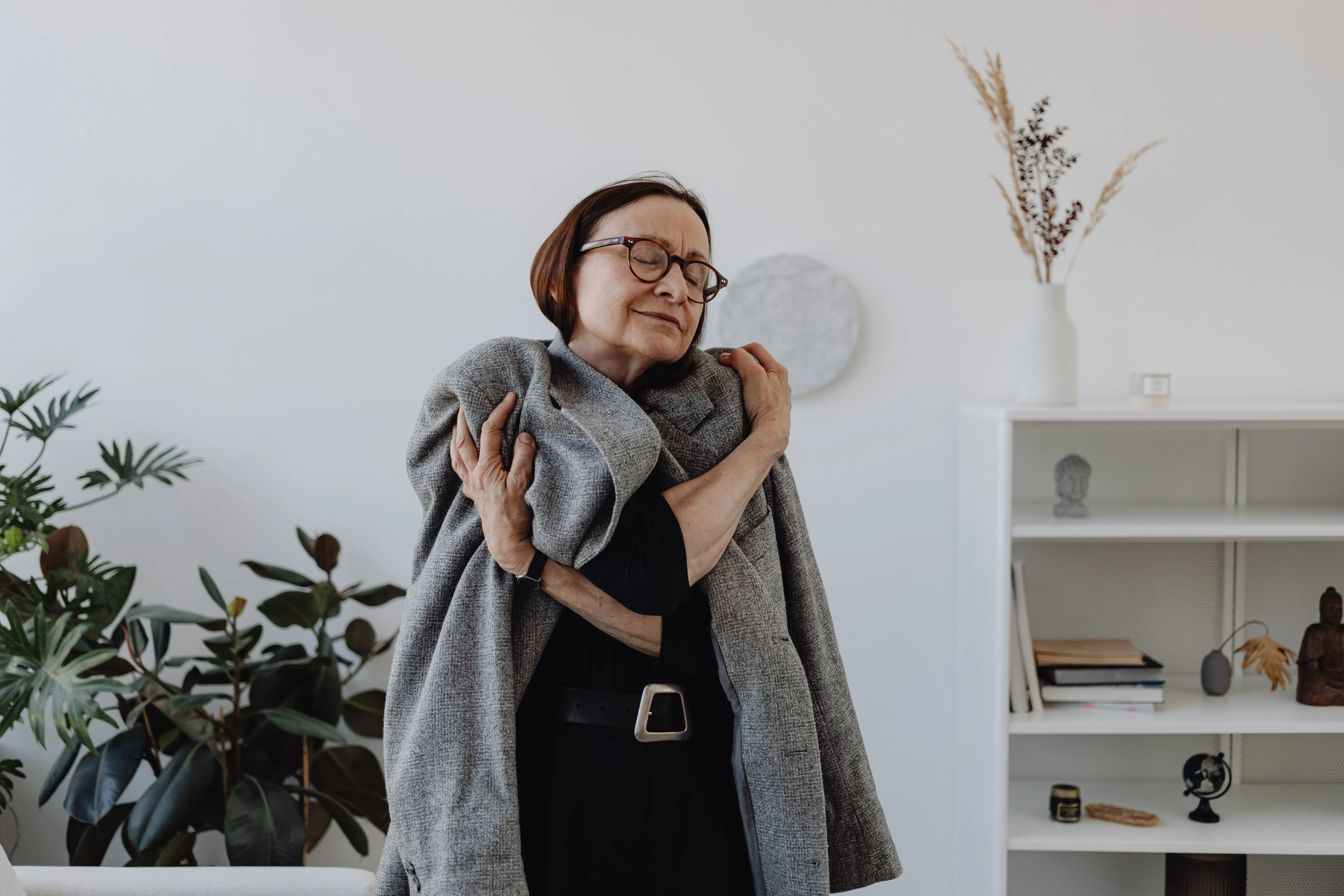 Woman accepting grief representing the survival state concept in resource therapy for women entrepreneurs Australia Woman accepting grief representing the survival state concept in resource therapy for women entrepreneurs Australia