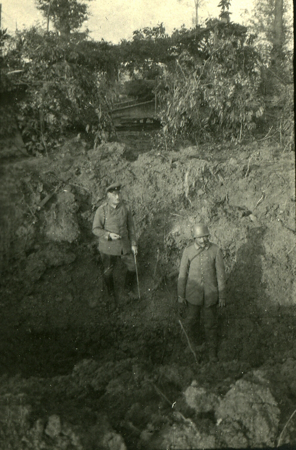 German Soldiers in Camouflaged Trench with Steel Helmet, World War I