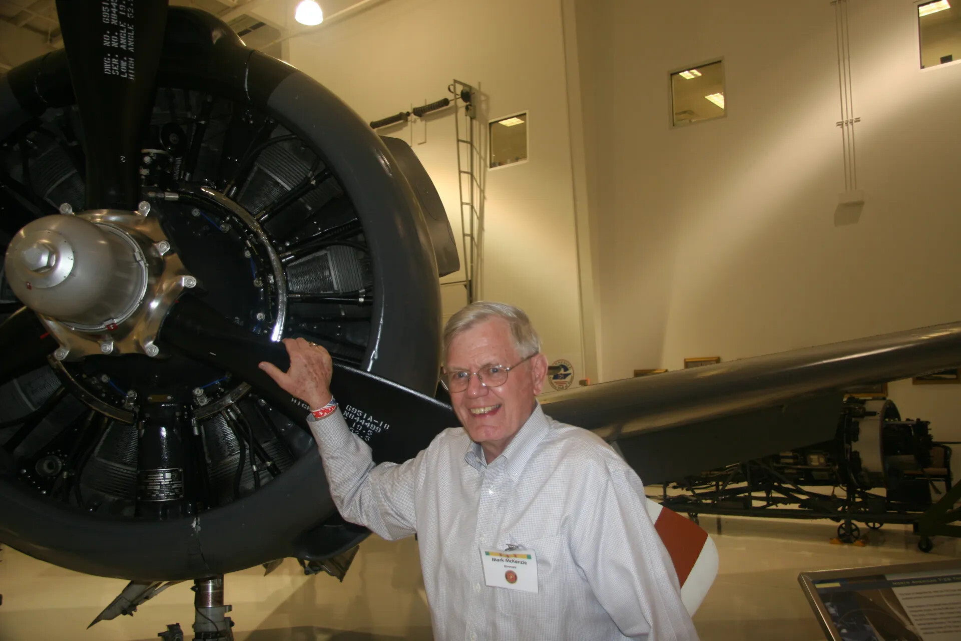 Museum Visitor Mark McKenzie Posing with Radial Engine Propeller, Aviation Museum