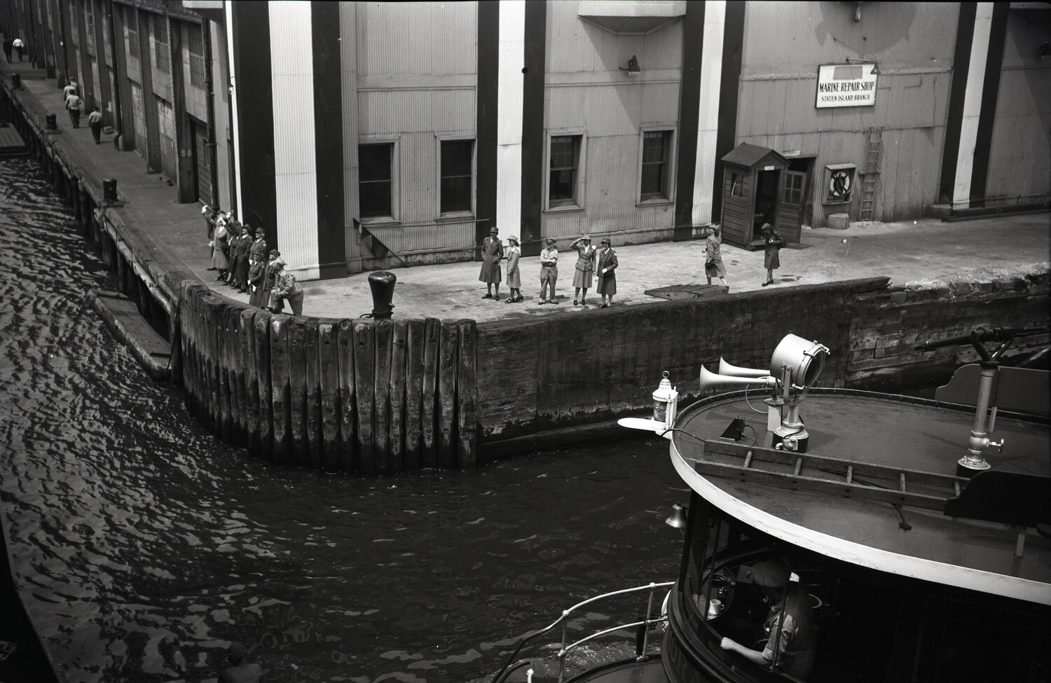 Pier Scene at Marine Repair Shop, Staten Island Branch, with Uniformed Women and Harbor Tug, WWII Era