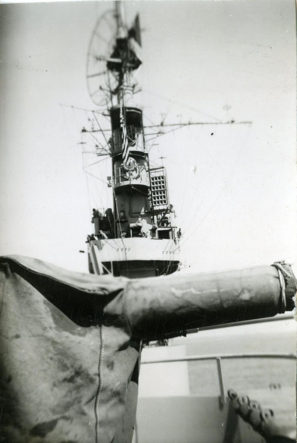 Warship Mast and Radar Array with Canvas-Covered Deck Gun, Pacific Theater, 1945 (VMF-214 Album)