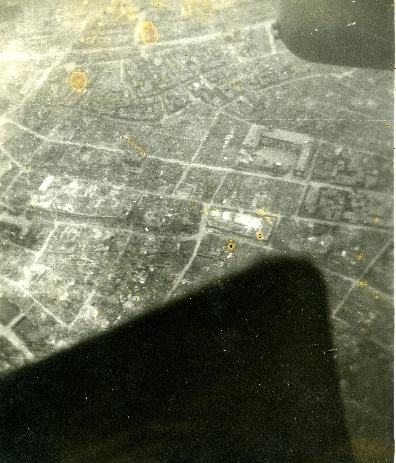 Vertical Aerial Reconnaissance Photograph, Urban District (Location Unidentified)