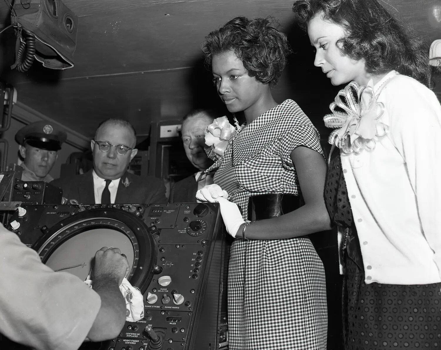 Corsage-Wearing Guests Observe Radar Scope Operation at Air National Guard Air Defense Facility