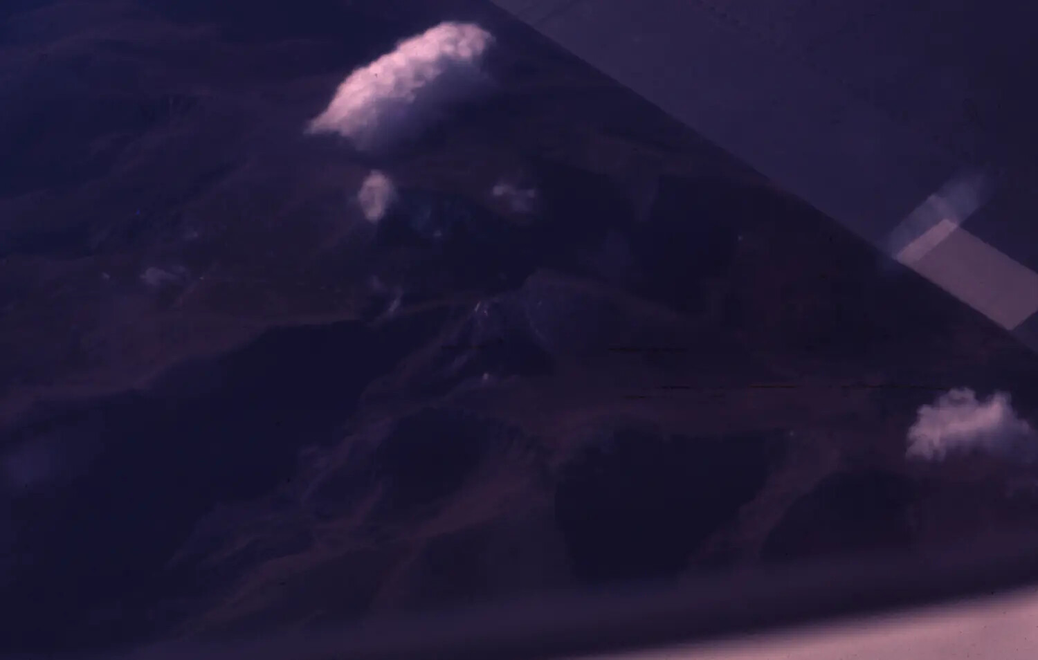 In-Flight Strike Photograph: Smoke Rising from Target Area, Southeast Asian Highlands, Vietnam War Era