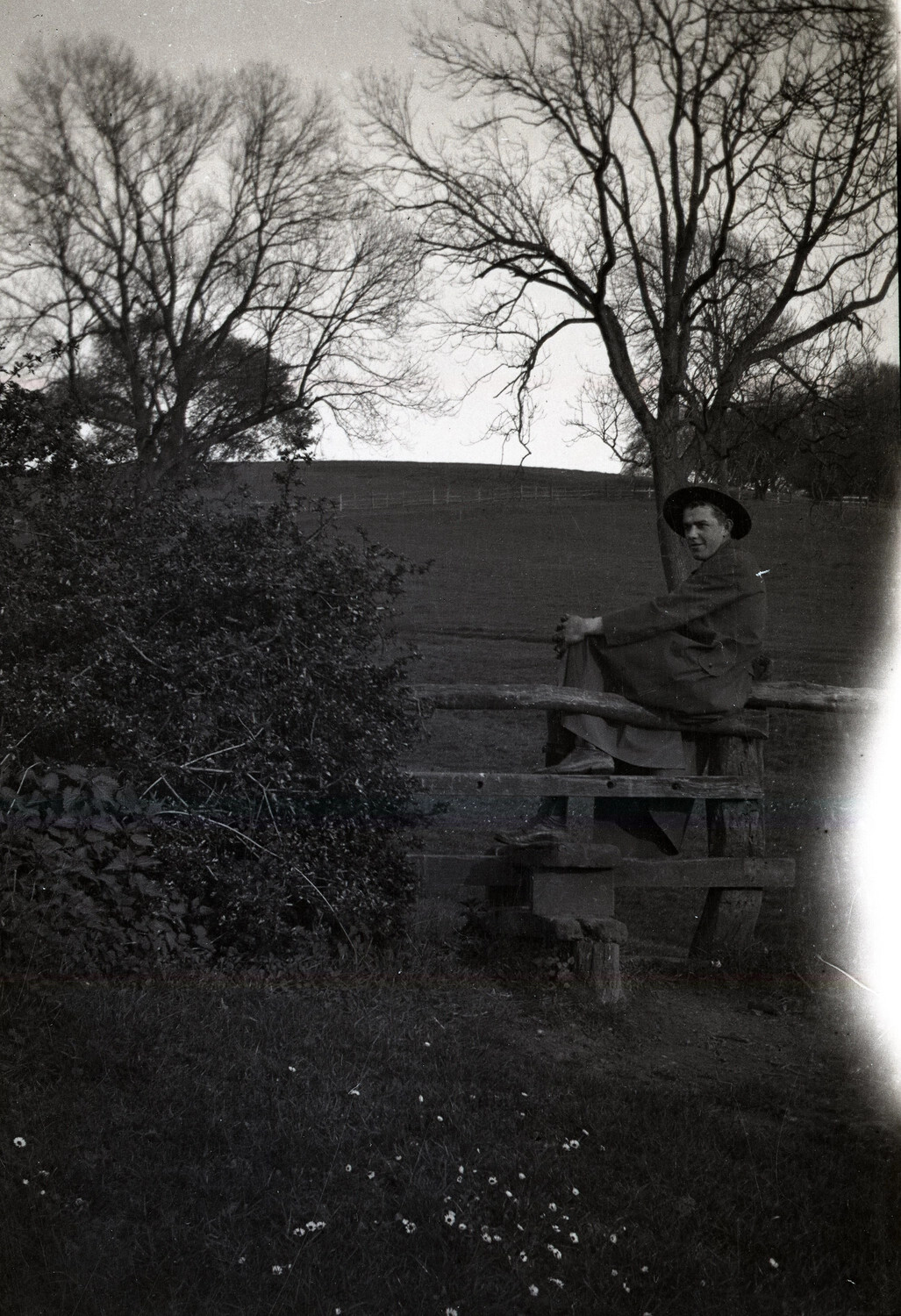 Serviceman Seated on a Country Stile, England, World War I Era