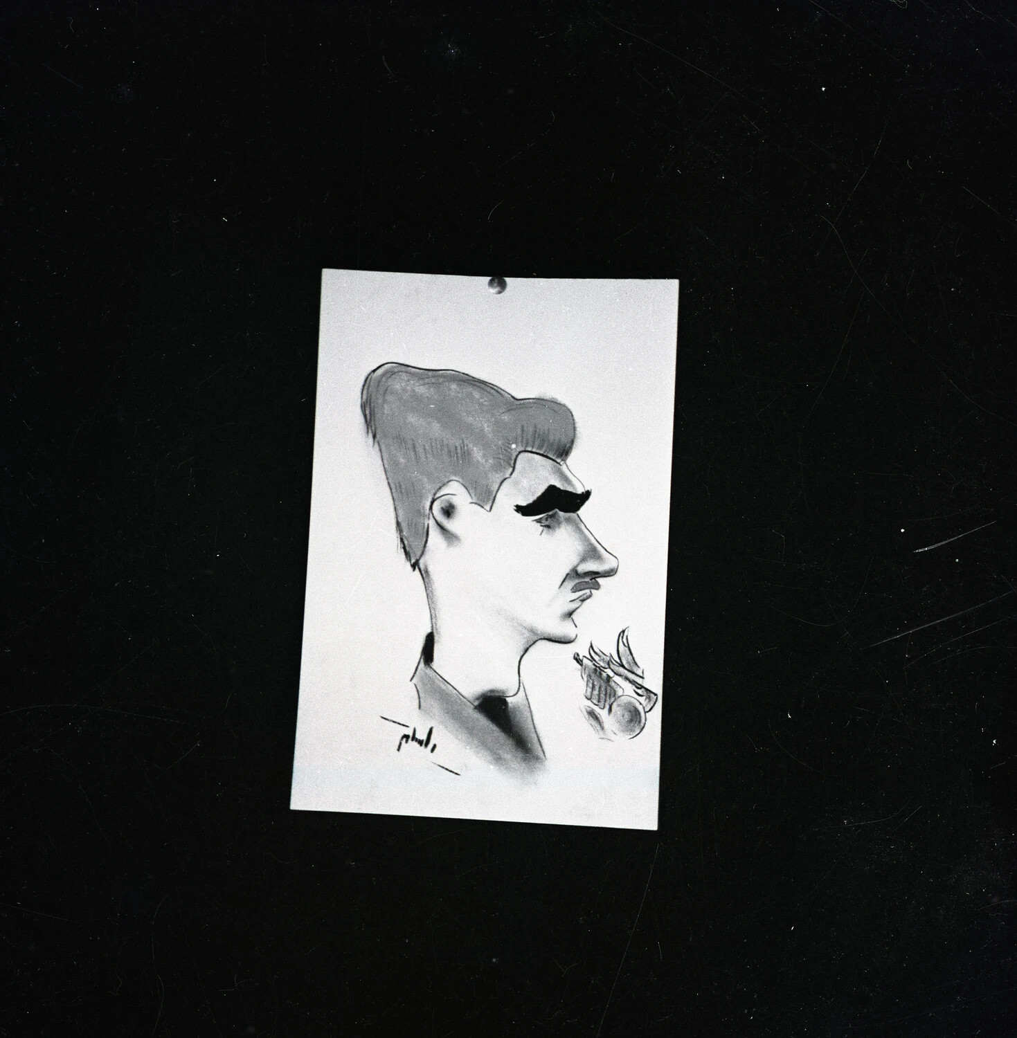 Copy Negative of a Pen-and-Wash Caricature Portrait, Pinned to Display Board