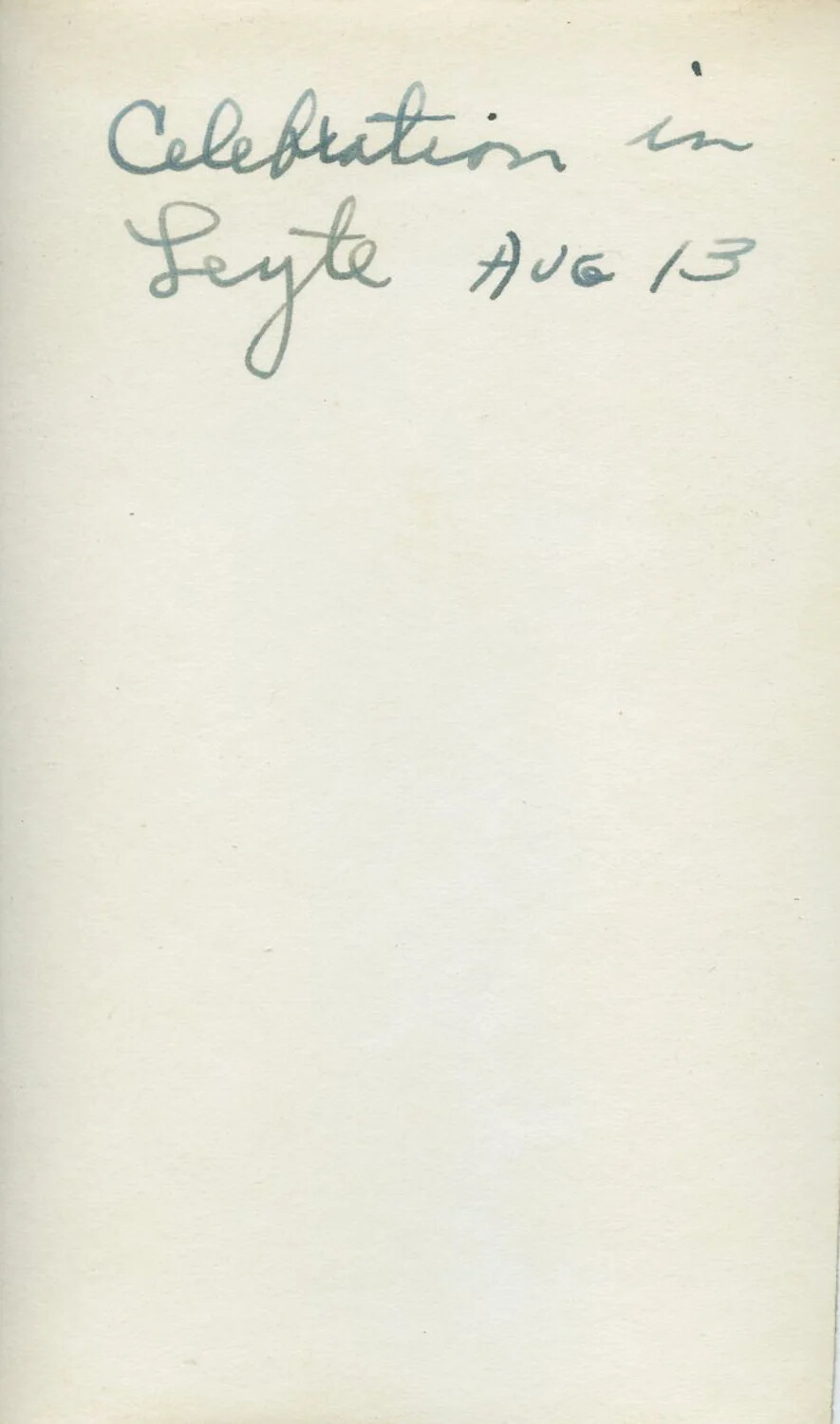 Handwritten Caption, Verso: 'Celebration in Leyte, Aug 13' (companion to photograph 218722-LEYTE003AA)