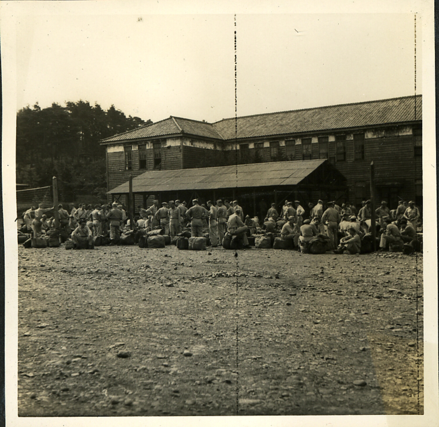 American Servicemen Assembled with Duffel Bags at Barracks, Occupied Japan