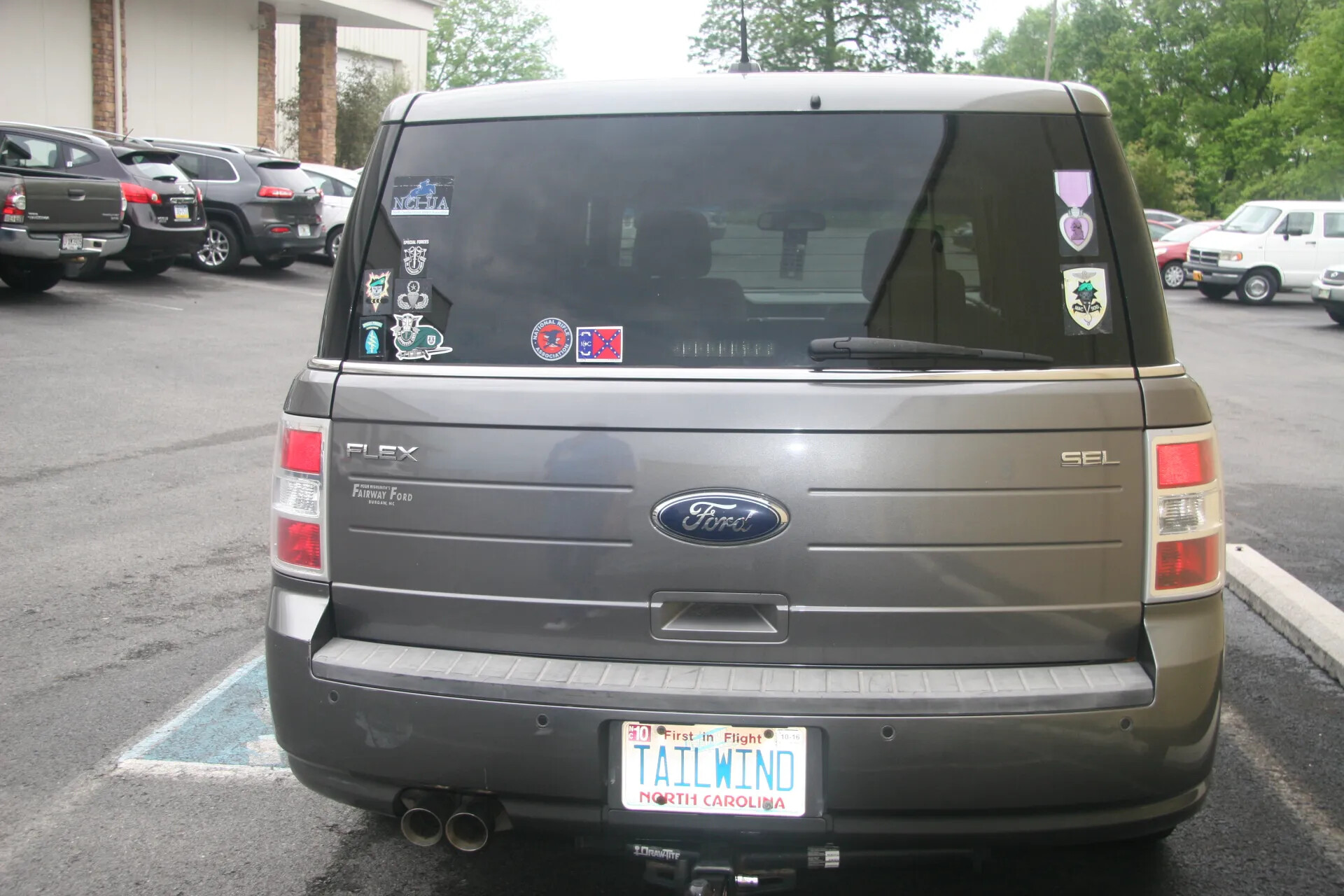 Rear View of Vehicle with 'TAILWIND' Vanity Plate and Special Forces Decals