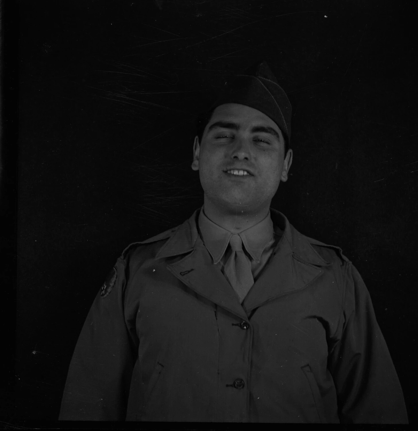 Serviceman in Garrison Cap and Dress Uniform - Candid Flash Portrait