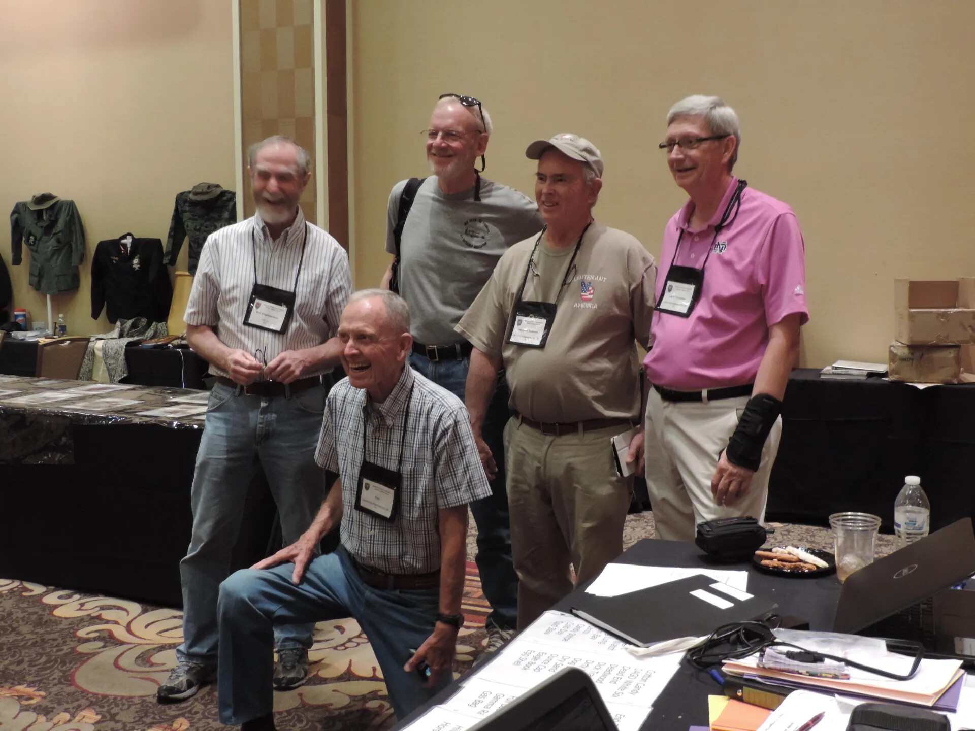 Five Members Laughing at the Registration Table, Special Operations Association Reunion, Las Vegas, 2013